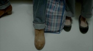 Кадр з фільму Мавпа на плечі