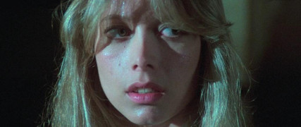 Кадр з фільму Будинок біля цвинтаря