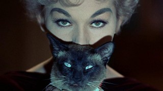 Кадр з фільму Дзвінок, книга, свічка