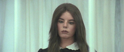 Кадр з фільму Будинок біля цвинтаря