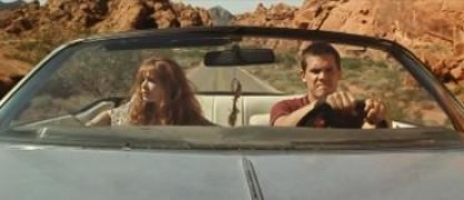 Кадр з фільму Квітка на дорозі