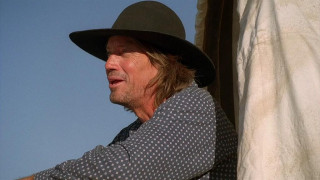 Кадр з фільму Захід сонця в прерії