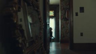 Кадр з фільму Проклятий будинок 2