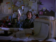 Кадр з фільму Вбивче чтиво