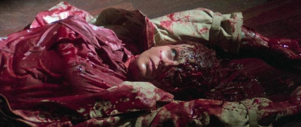 Кадр з фільму Будинок біля цвинтаря