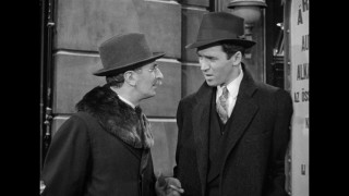 Кадр з фільму Крамничка за рогом