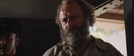 Кадр з фільму Знахар