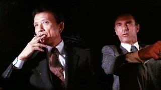 Кадр з фільму Танго і Кеш