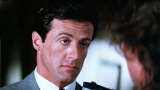 Кадр з фільму Танго і Кеш