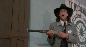 Кадр з фільму Стрілець від Бога