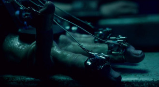 Кадр з фільму Пила 10