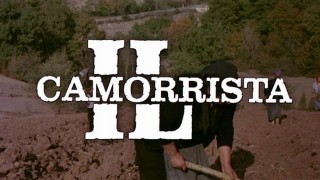 Кадр з фільму Член Комори