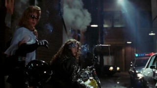 Кадр з фільму Танго і Кеш